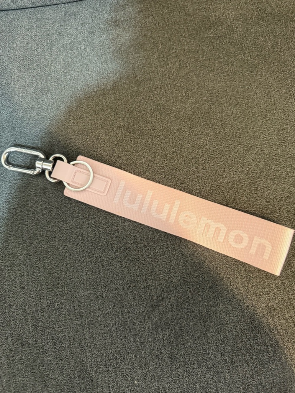 NEW WITHOUT TAGS PINK LULULEMON KEYCHAIN